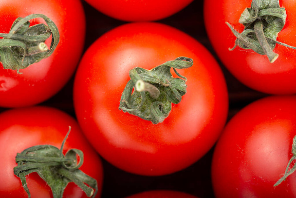Red tomatoes background. Top view. - Photo, Image
