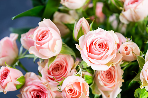 Bouquet of several branches of pink roses. Background of pink roses - Foto, immagini
