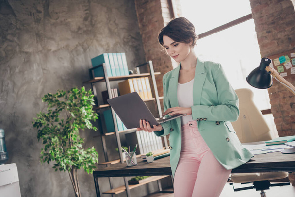 Profile photo of pretty business lady hold notebook hands chatting colleagues corporate report insurance agent home remote work wear blazer pants lean table modern interior office indoors - Photo, image