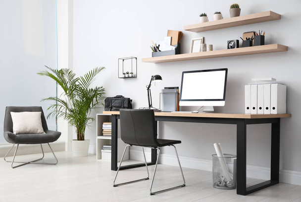 Modern computer on table in office interior. Stylish workplace - Φωτογραφία, εικόνα
