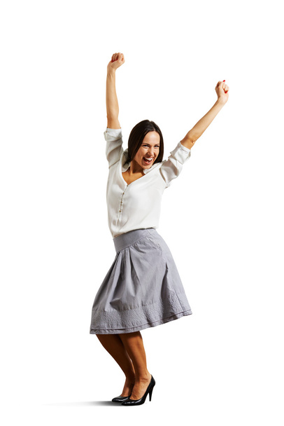 successful young woman raising hands up - Photo, Image