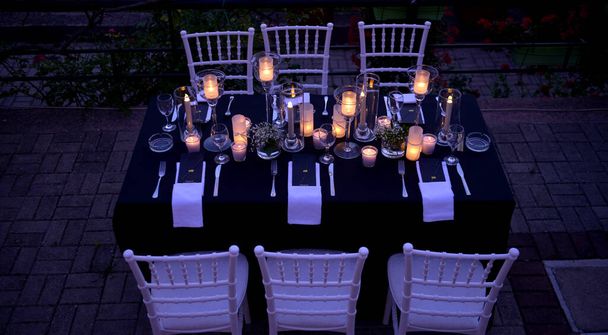 dinner table at a wedding by night image - Photo, Image