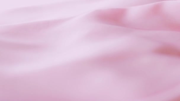 Tessuto di seta rosa in primo piano come sfondo di marca di moda, superficie tessile e materiale liscio di lusso - Filmati, video