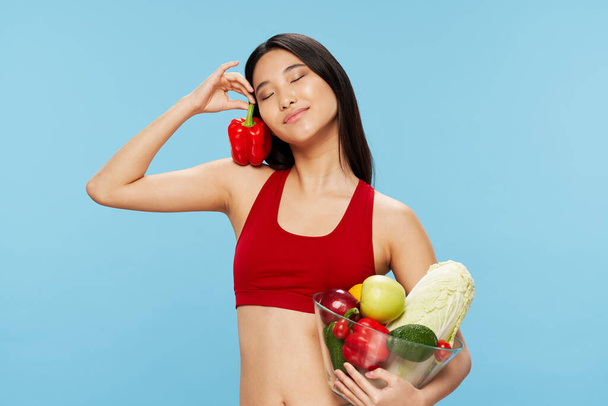 Woman slim figure diet fresh vegetables  - Photo, Image