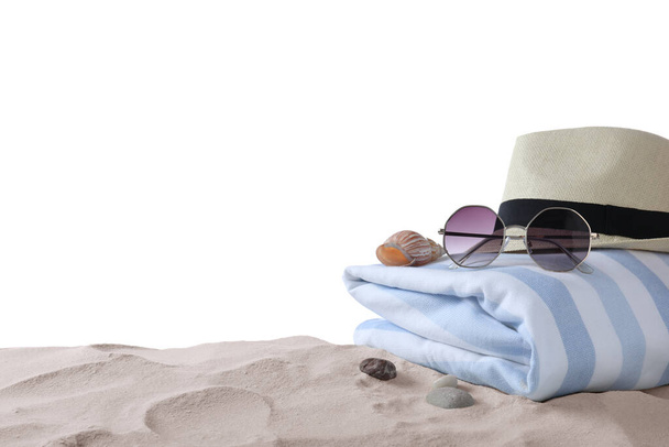 Composition with beach objects on sand against white background. Space for text - Foto, Bild