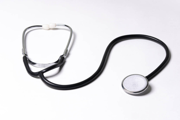 Black stethoscope isolated on white background - Foto, Imagen