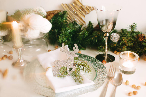 Festive table setting for Christmas and New Year. Soft focus. - Fotó, kép