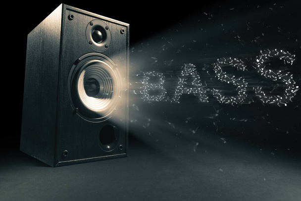 Black wooden sound speaker with sound wave and text bass on black background. - Photo, Image