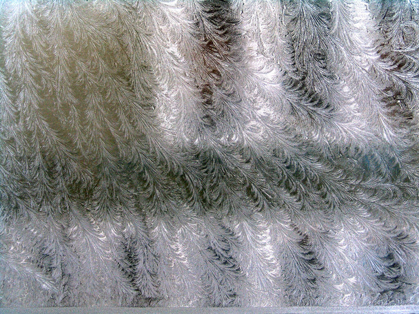 Frosty photo de fond d'hiver de l'accumulation de glace sur une fenêtre - Photo, image