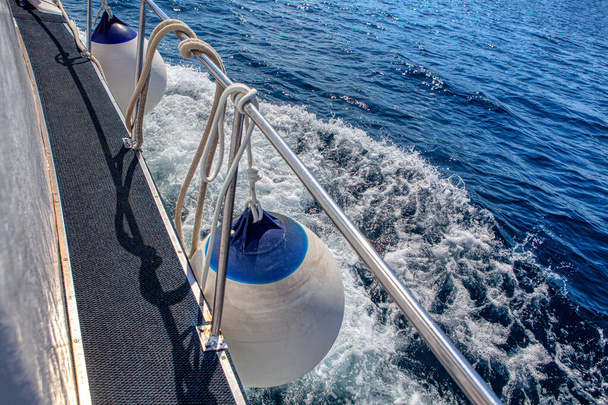 Boat Fenders and Buoys . Aboard the ship . Traveling by Sea - Photo, Image