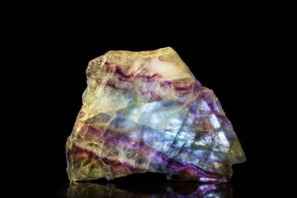 Fluorite Mineral Stone in front of Black - Photo, Image