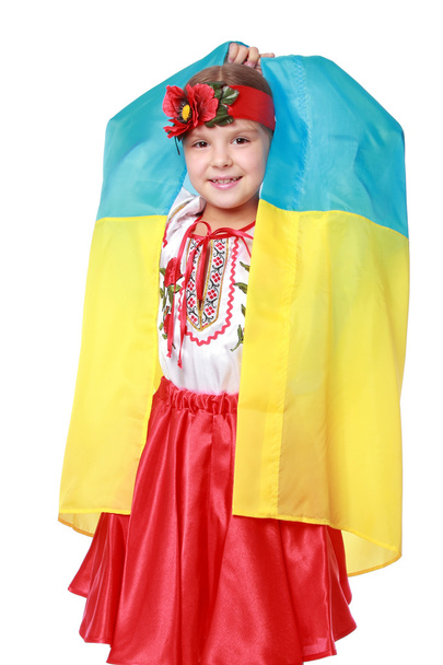 Girl in a beautiful national Ukrainian suit - Фото, зображення