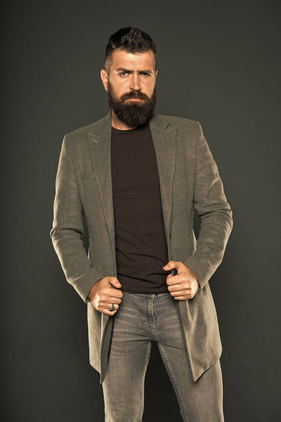 Brutal hipster man. Hipster wearing casual clothes. Hipster with beard hair and stylish haircut. Bearded man trendy hipster style. Warm jacket. Daily outfit. Fall fashion. Maintaining masculine look - Valokuva, kuva