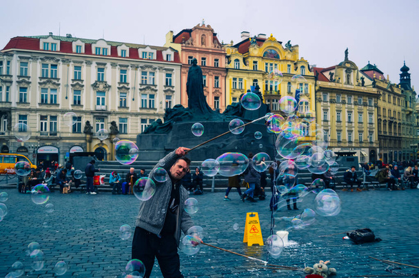 Man creating Soap Bubbles in Prague Town Square - Photo, Image