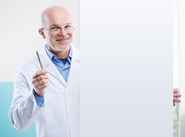 Doctor with sign - Foto, Imagen
