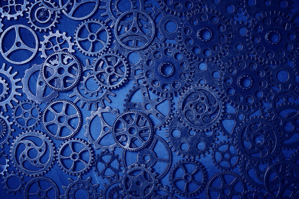 Gears, blue abstract background, lots of small gears, steampunk - Photo, image