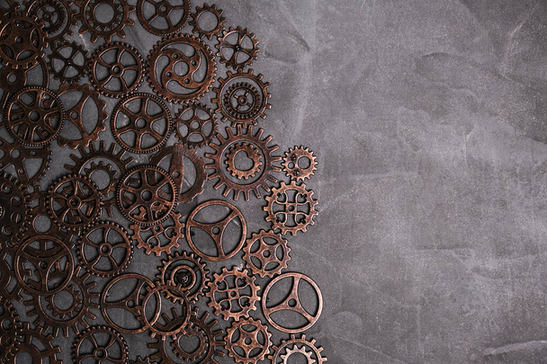 Lots of concrete-based gears.Background, gears and steampunk - Фото, изображение