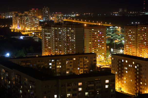 view of a city at night - Fotó, kép