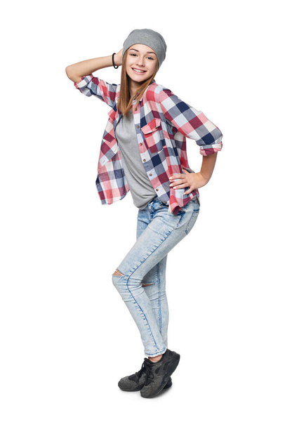 Smiling relaxed teen girl standing in full length - Fotoğraf, Görsel