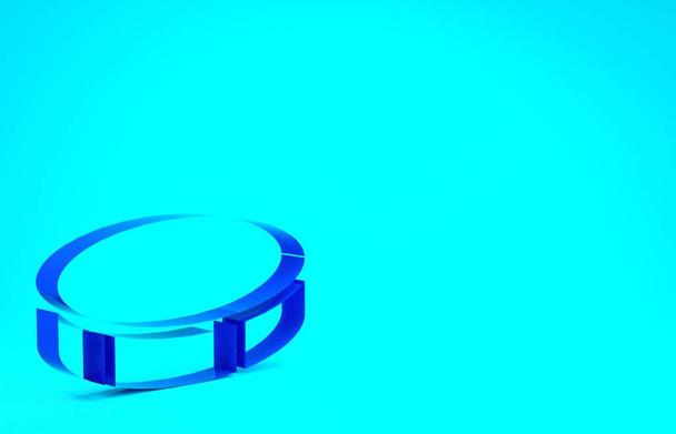 Blue Hockey Puck Symbol isoliert auf blauem Hintergrund. Sportgeräte. Minimalismus-Konzept. 3D Illustration 3D Renderer - Foto, Bild
