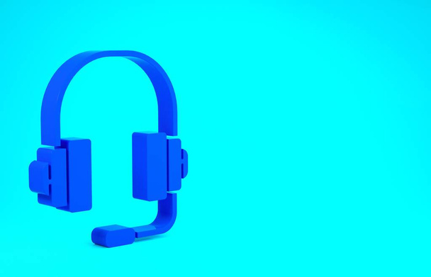 Niebieskie słuchawki ikona izolowane na niebieskim tle. Obsługa klienta, infolinia, call center, faq, konserwacja. Koncepcja minimalizmu. Ilustracja 3D 3D renderowania - Zdjęcie, obraz