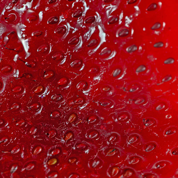 Bright red juicy strawberry closeup background - Fotografie, Obrázek