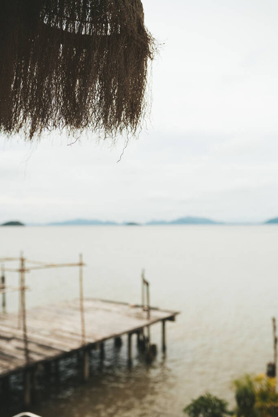 View to the sea from cafe at Chinese street in old town Koh Lanta, Thailand - Фото, изображение