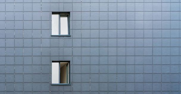 small windows with white skyscape reflections in local city - Valokuva, kuva