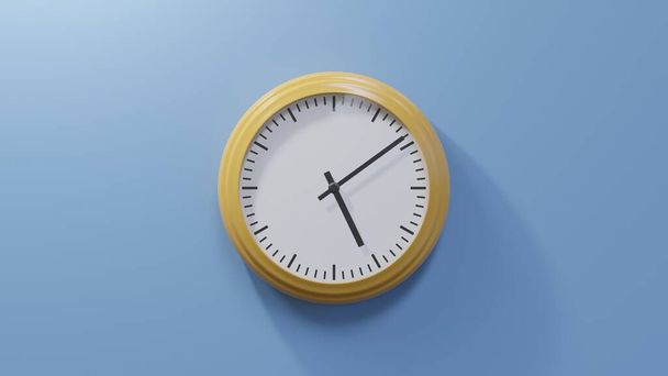 Глянцевий помаранчевий годинник на синій стіні о дев'ятій за п'ять. Час 05:09 або 17:09
 - Фото, зображення