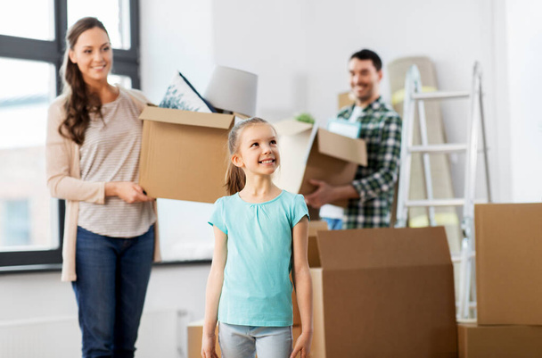 happy family with child moving to new home - Foto, Bild