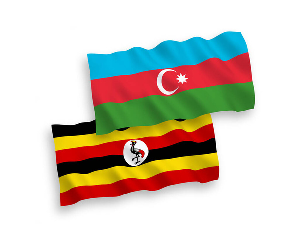 Beyaz arka planda Azerbaycan ve Uganda 'nın ulusal taşıyıcı kumaş bayrakları izole edildi. 1 'e 2 oranında. - Vektör, Görsel
