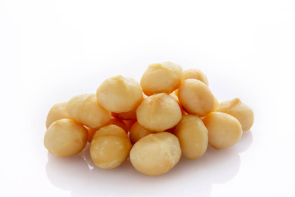 Voedende noten, macadamiabonen, macadamianoten, macadamianoten, - Foto, afbeelding