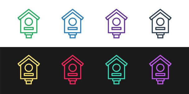 Set line Bird house icon isolated on black and white background. Nesting box birdhouse, homemade building for birds. Vector - Вектор,изображение