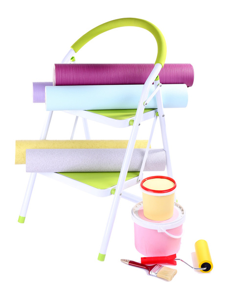 Small ladder and wallpaper rolls, isolated on white - Zdjęcie, obraz