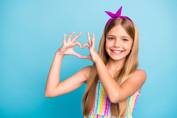 Close-up portrait of her she nice-looking attractive charming lovable cheerful cheery long-haired girl showing heart gesture symbol isolated over bright vivid shine vibrant blue color background - Foto, Bild