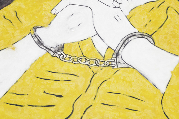 Handcuffs on hands - Photo, Image