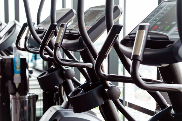 Detail image of Treadmill in fitness room background  - Photo, Image