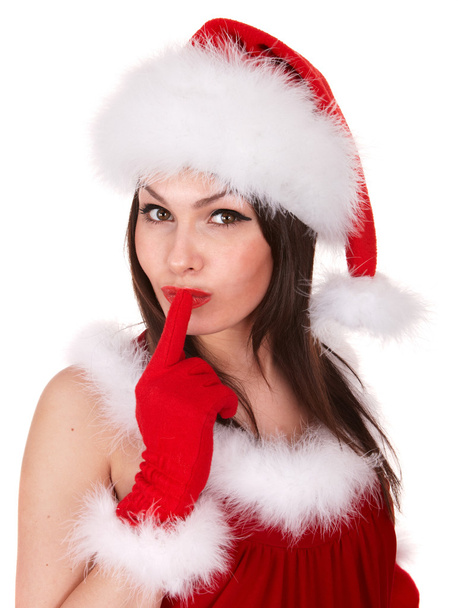 Christmas girl in santa hat making silence gesture. - Фото, изображение