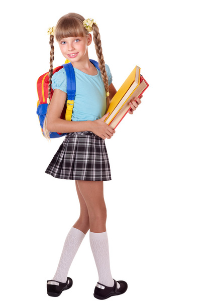Schoolgirl with backpack holding books. - Foto, Imagen