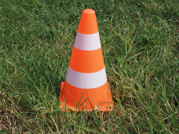 white and orange traffic cone to mark road works - Photo, Image