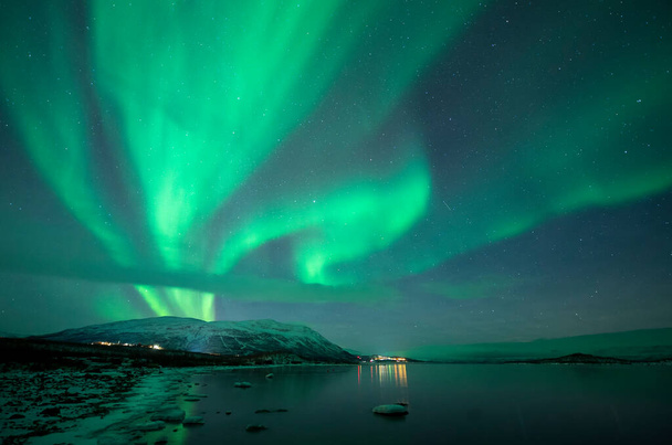 Aurora Borealis Northern Lights near Abisko and Lake Tornetrask in Arctic Sweden. High quality photo - Photo, Image