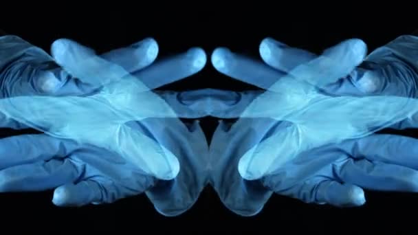 Video van bewegende handen met latex handschoenen - Video