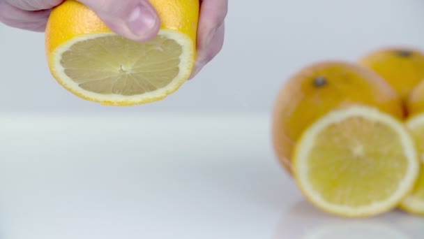 Squeezing lemon with palms - Footage, Video