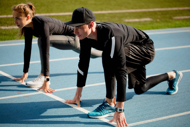 young ambitious fit people are concentrated on the race - 写真・画像