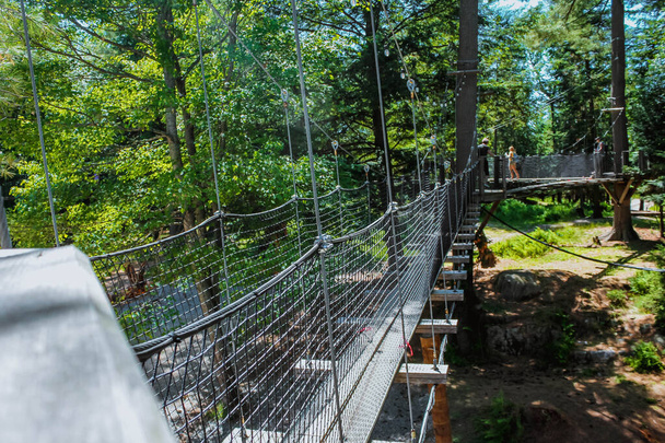 Suspension bridge, walkway to the adventurous, cross to the other side. - Photo, Image
