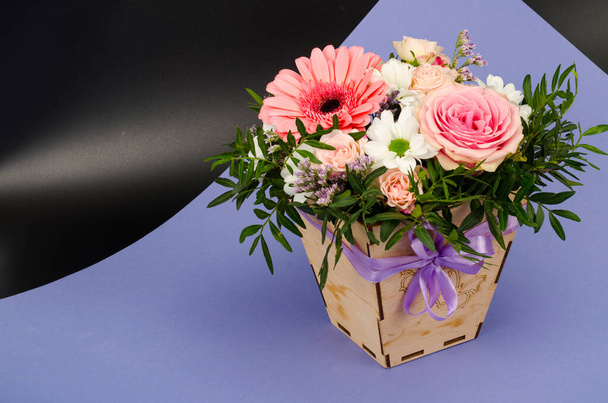Flowers, bouquet in stylish wooden box. Studio Photo - Photo, Image