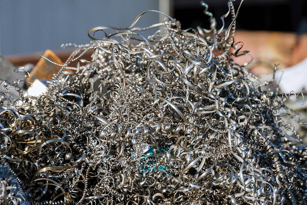 Metal shavings. Wastes from iron production. Metal processing on CNC machines in production. - Photo, Image