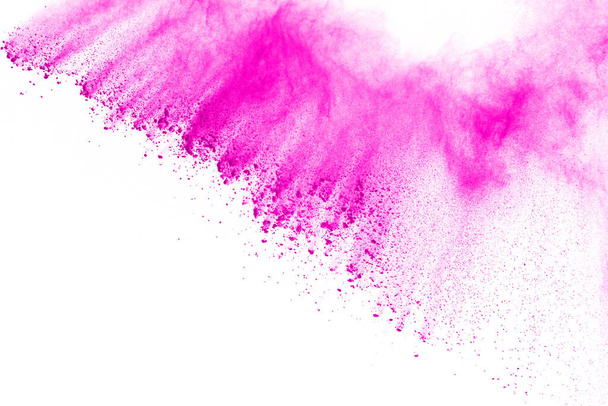Abstract pink powder splatted background,Freeze motion of color powder exploding/throwing color powder,color glitter texture on white background. - Photo, Image