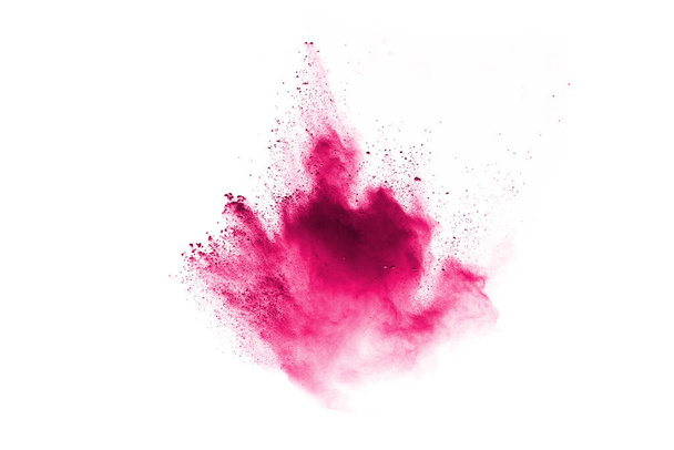 абстрактний рожевий порошок розділений фон, заморожування руху кольорового порошку вибуху / кидання кольорового порошку, текстури кольорового глютера на білому тлі
. - Фото, зображення