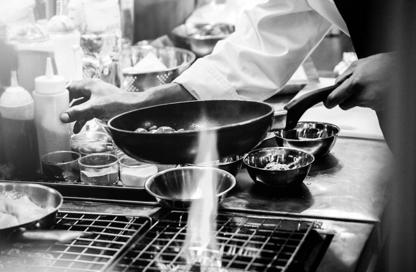 Chef cooking in a kitchen, chef at work, Black & Whit - Photo, Image